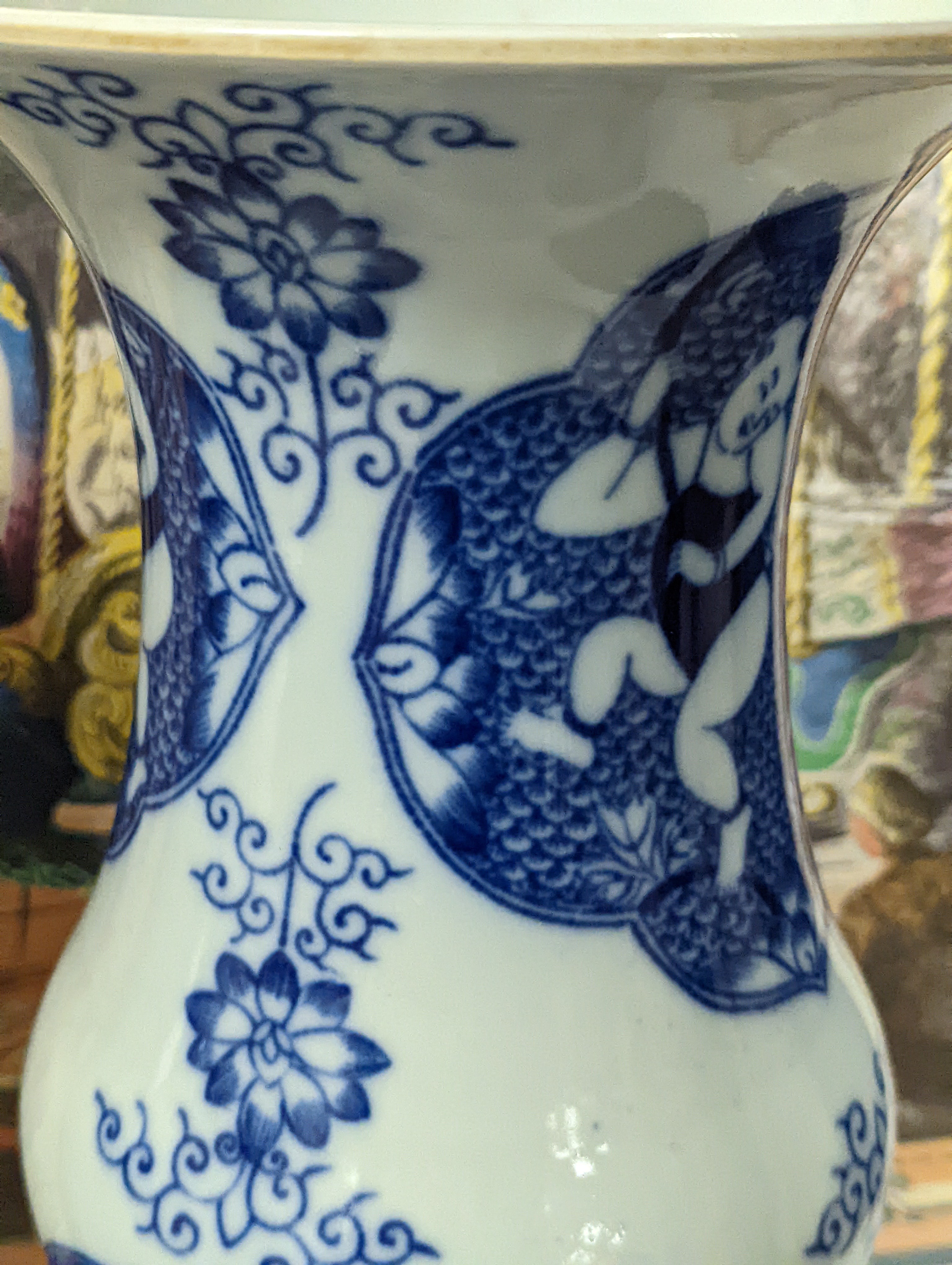 A pair of Chinese blue and white vases on stands and 6 further wood stands. Vases 35cm